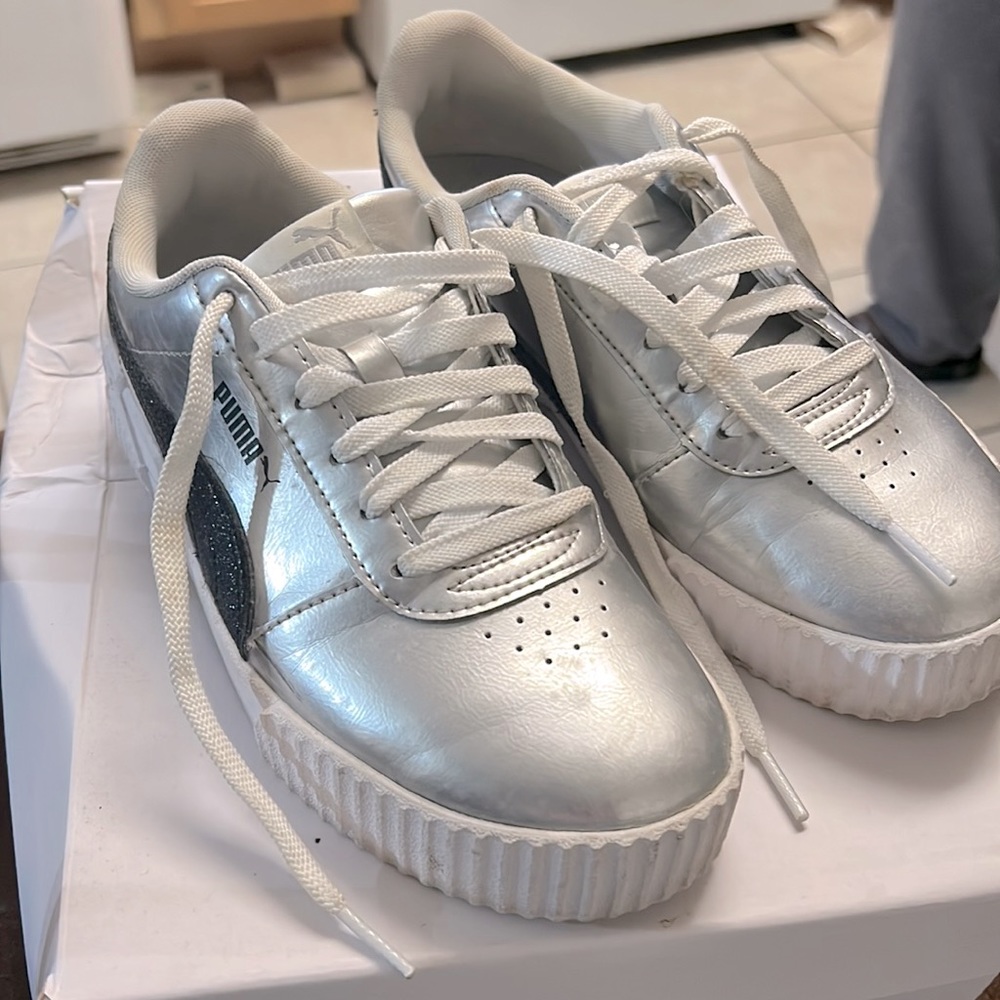 Silver low cut Puma sneakers!  Great deal